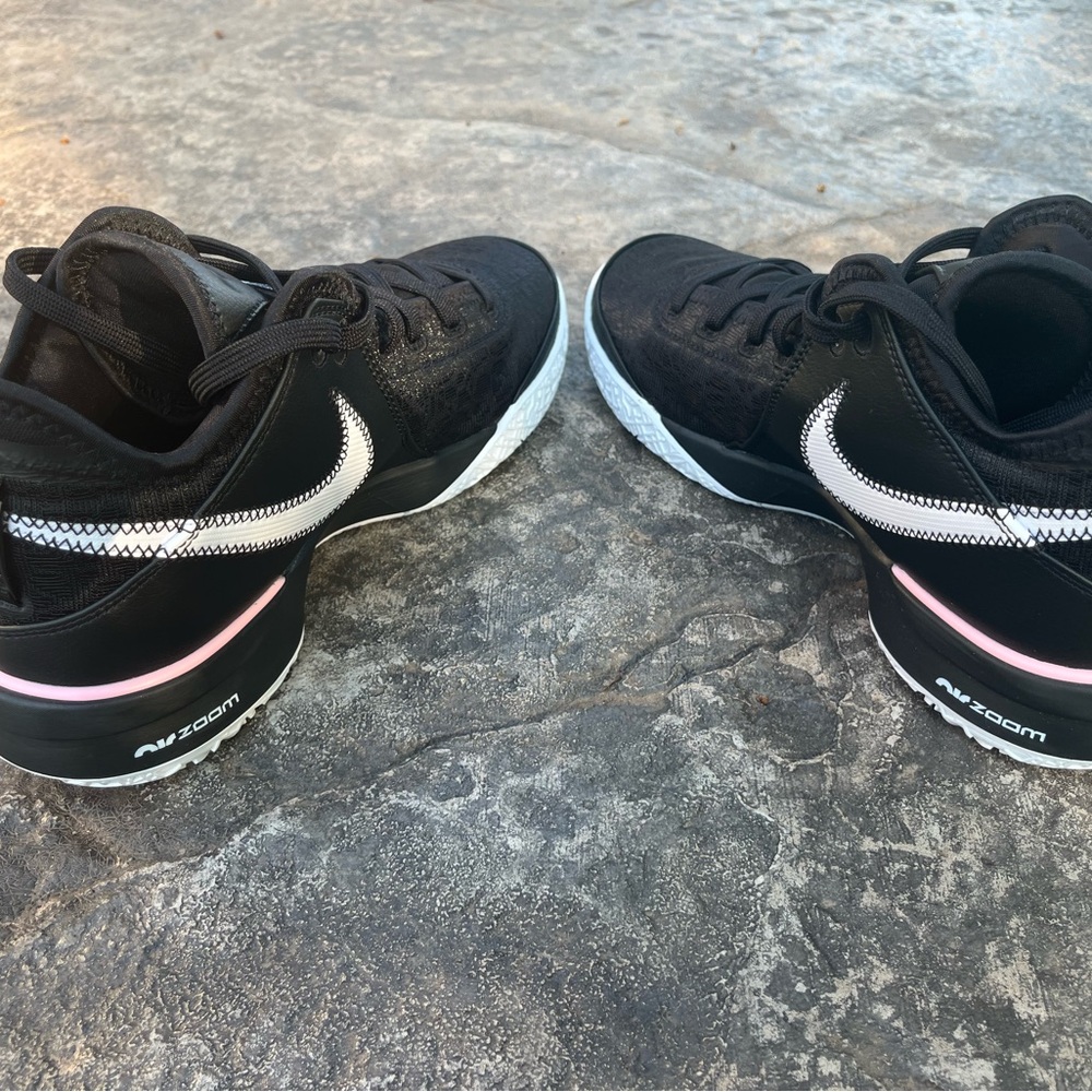 Nike Black and Pink Athletic Shoes Streamlined Design